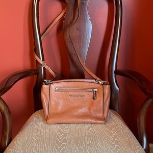 Micheal Kors authentic brown leather crossbody purse.